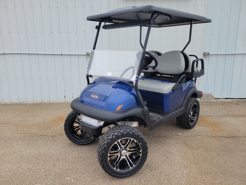 2024 CLUB CAR V4L GAS LIFTED GOLF CART, BLUE IN COLOR, GREY SEATS, BLACK LONG TOP, GAS ENGINE, TURNSIGNALS, HORN, BRAKE LIGHTS, MIRROR, WARRANTY